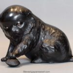 CUTE JAPANESE BRONZE OKIMONO OF AN AKITA PUPPY WITH CLAM SHELL