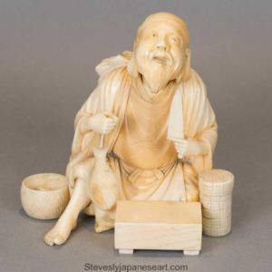 JAPANESE IVORY OKIMONO OF EBISU - THE LUCKY GOD OF PROSPERITY AND WEALTH