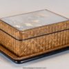 A JAPANESE SILVER MOUNTED AND BASKET WEAVE TRINKET BOX ON STAND