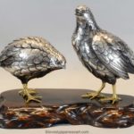 A CHARMING JAPANESE SILVERED BRONZE QUAIL OKIMONO BY HIDENAO
