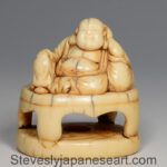 CHARMING JAPANESE EDO PERIOD IVORY NETSUKE DEPICTING HOTEI - GOD OF GOOD FORTUNE