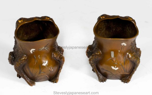 HUMEROUS PAIR OF JAPANESE MIXED METAL BRUSH POT TOADS BY NOGAWA