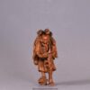 A WELL CARVED JAPANESE CARVED WOODEN NETSUKE - ABURA BOZU - THE OIL THIEF