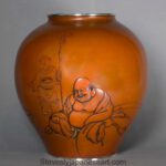 A FINE JAPANESE HAND BEATEN COPPER AND SILVER VASE DEPICTING HOTEI - SIGNED