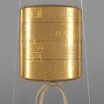 A JAPANESE THREE CASE SIGNED GOLD LACQUER INRO